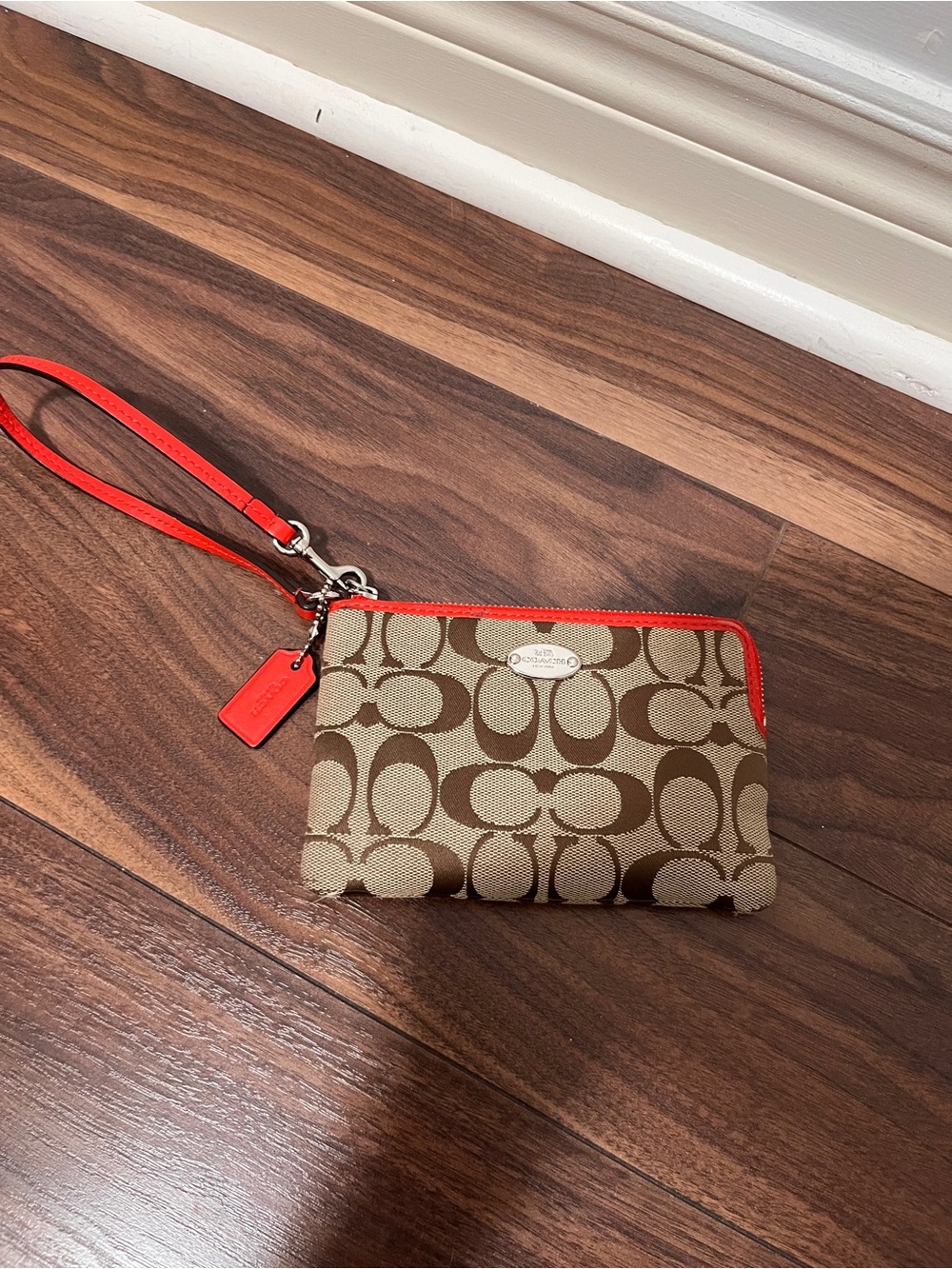 Coach Tan Signature Canvas Wristlet with Orange Trim
